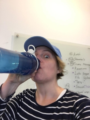 This is what long-distance parenting looks like. I sent that selfie to my daughter to prove to her I was drinking my water...in the middle of thesis.