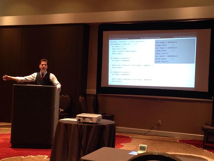 Marcus Phillips presents a focused, interactive lesson at JS Conf. PHOTO: Kwyn Meagher, @HarleyKwyn