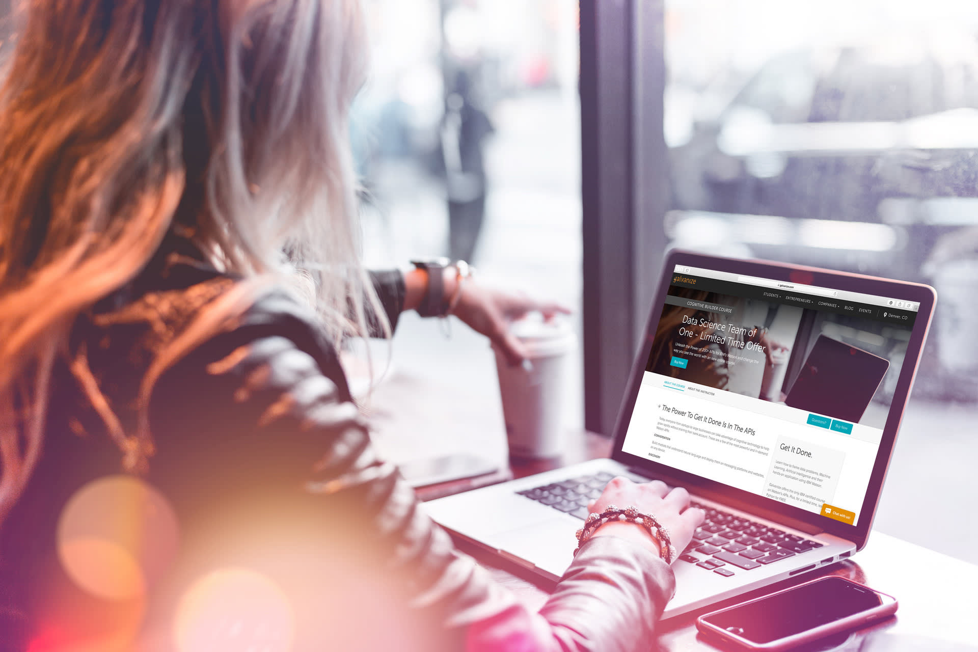 Woman looking at computer screen for CSS article.
