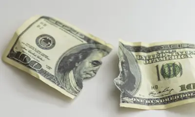 ¿Dónde cambiar dólares rotos?