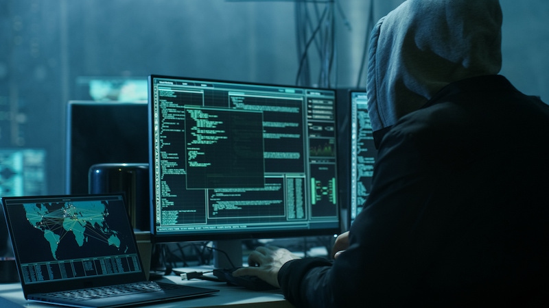 a hacker using computers