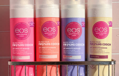 4 eos shaving cream products lined up in a shower organizer