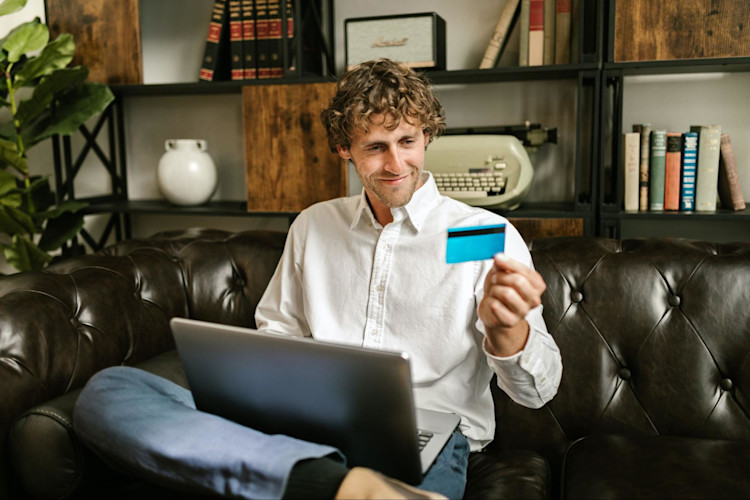 A man who has just purchased a credit term life insurance policy to pay of credit card debt.
