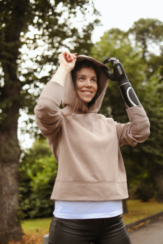 A woman who is smiling because she qualifies for Life Insurance even with a disability.