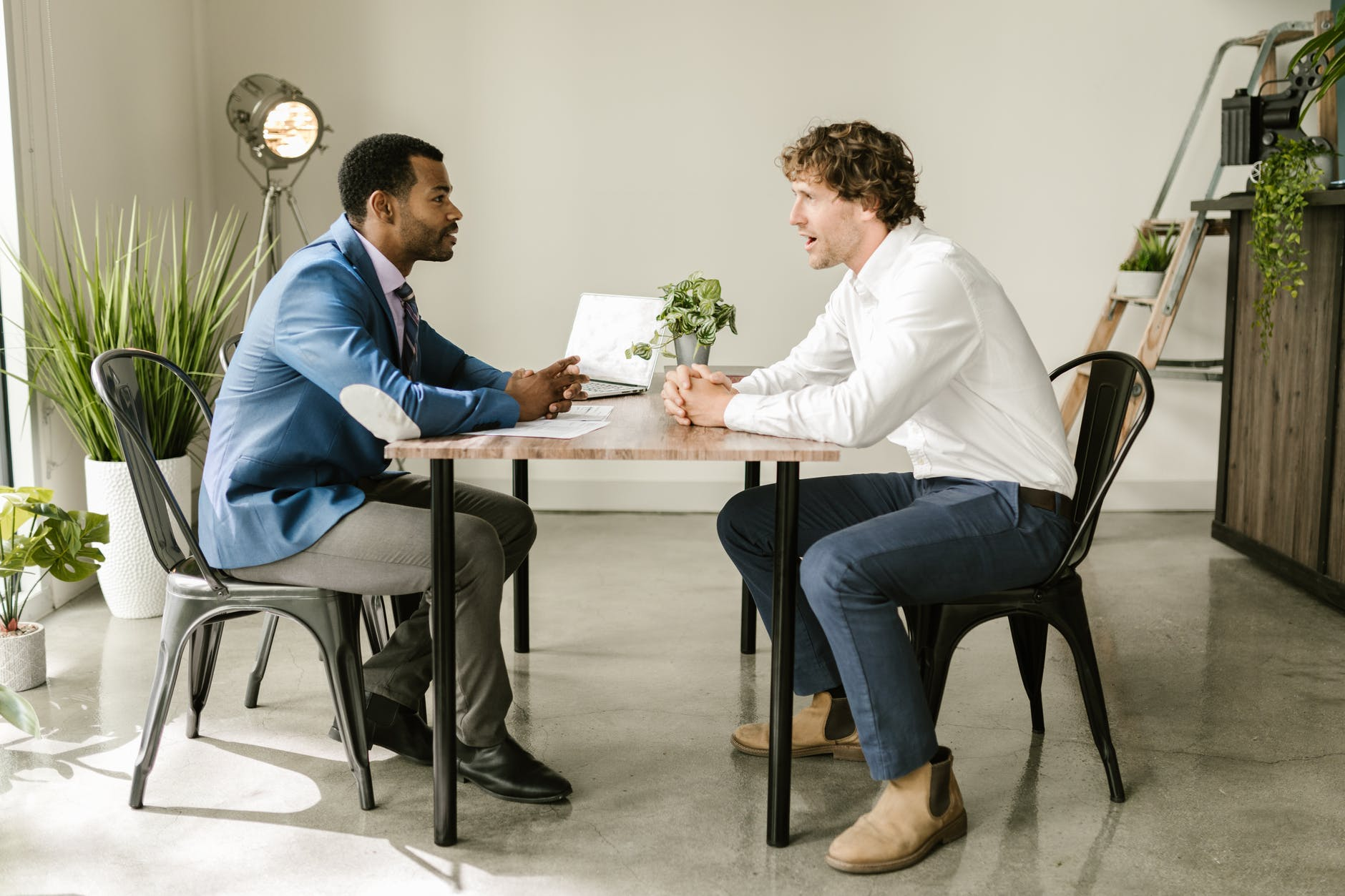 A man meeting with his Life Insurance Agent.