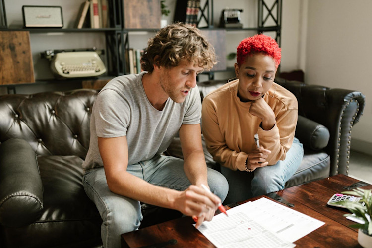 A man and woman viewing the different types of life insurance.