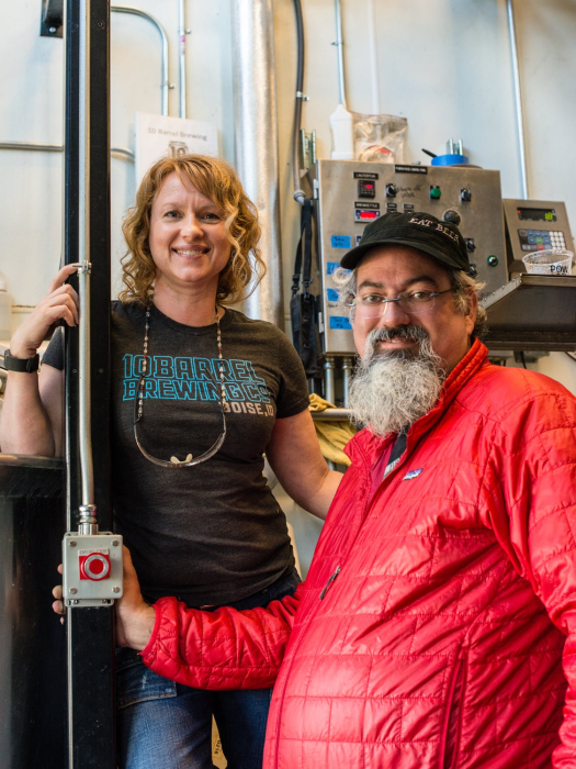 A couple who is happy because they have voluntary life insurance.