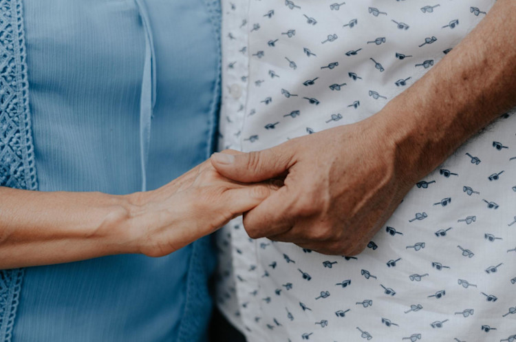 A couple that is holding hands.