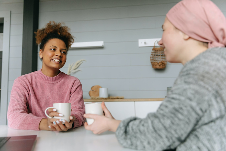 Two women discussing if you can get life insurance if you have cancer.