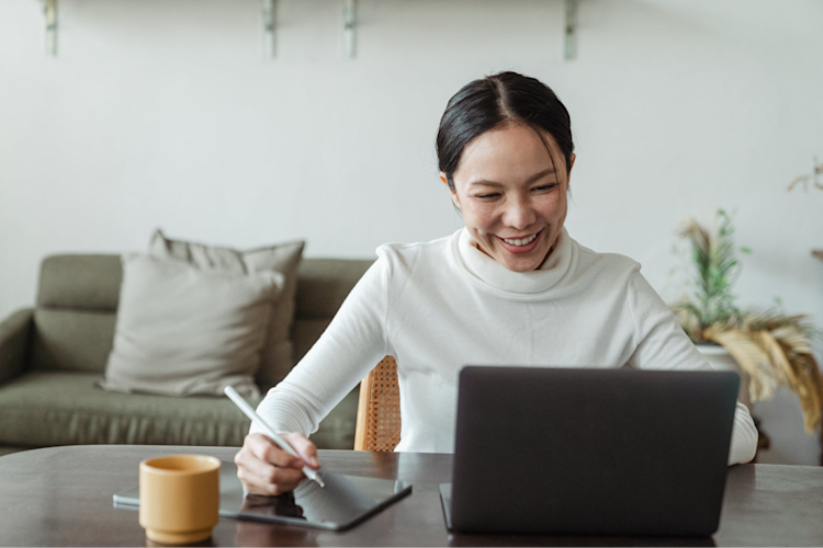 A woman signing up for Life Insurance.