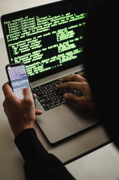 A scammer stealing information from a persons computer.