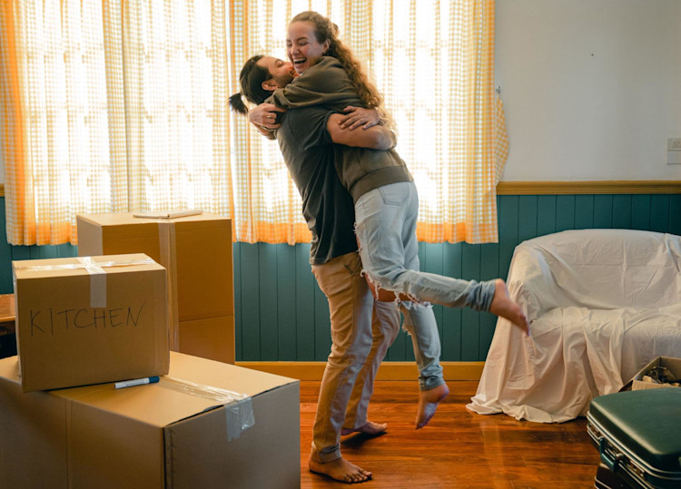 A happy couple who have Mortgage Life Insurance.
