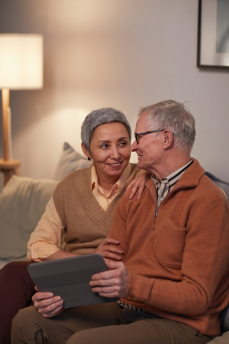 A man and woman deciding whether to sign up for Final Expense Insurance or Burial Insurance.