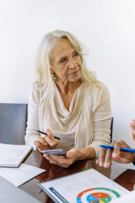 A an elderly woman who is signing up for Final Expense Insurance.