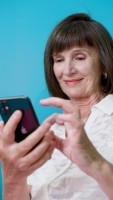 A women looking at Medicare Supplement Plans on her phone.