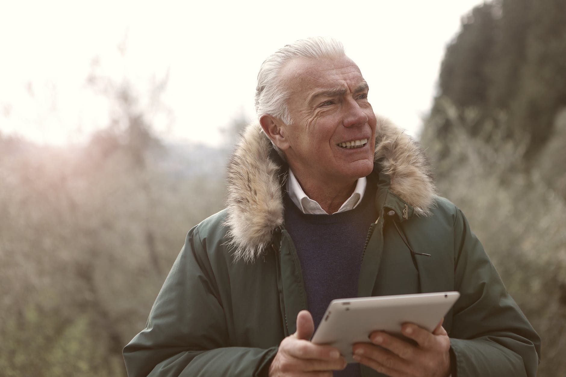 An older man looking through his Medicare coverage options.