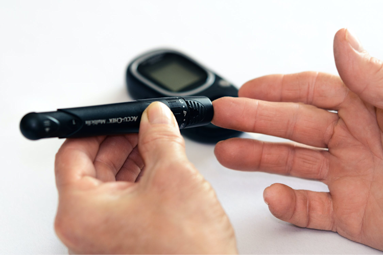 Someone checking their blood sugar levels.