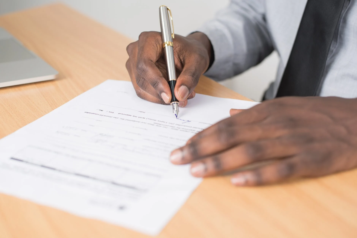 A person signing up for Life Insurance.
