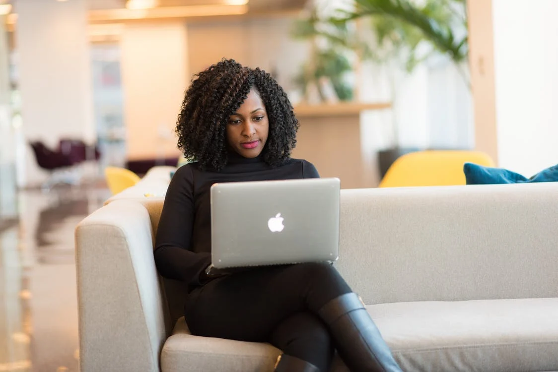 A woman researching between Term and Permanent Life Insurance.