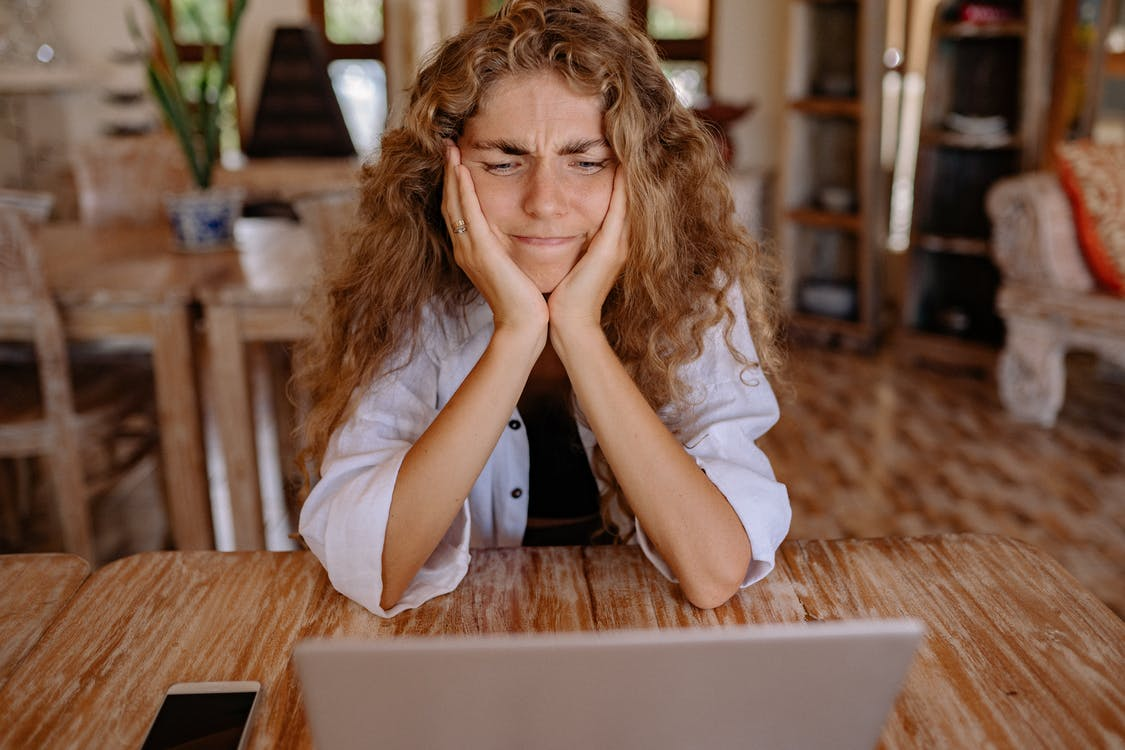 A woman dealing with a brushing scam.