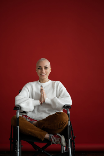 A woman in remission who is covered by Life Insurance.