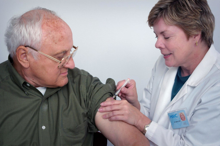 An elderly man receiving home health care.