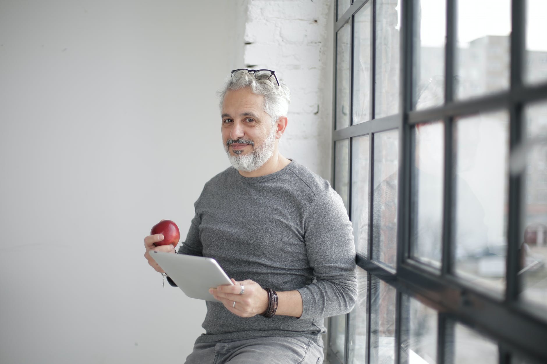 An elderly man that is happy that his Private Medicare Plan was not rejected.