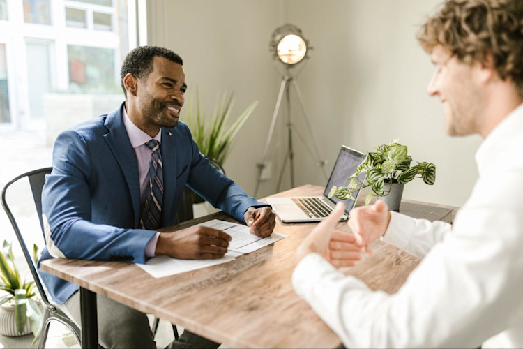 A man signing up for Renewable Term Life Insurance.