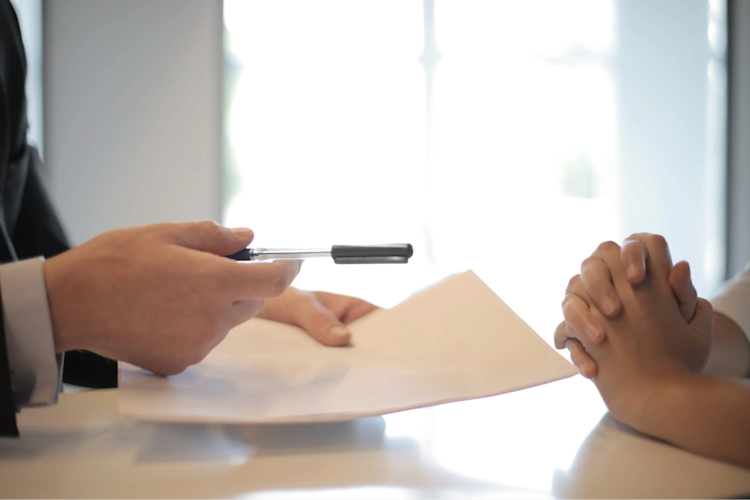 A person signing up for Life Insurance.