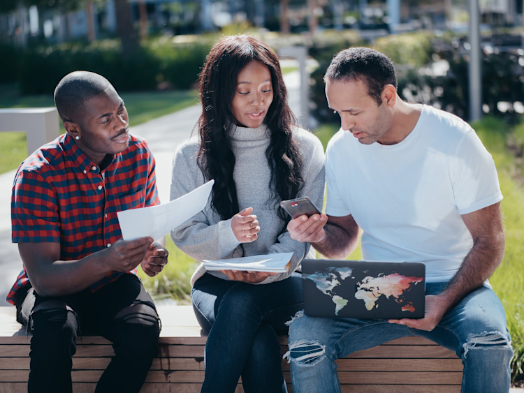 A group of people deciding whether to choose whole life insurance and term life insurance.