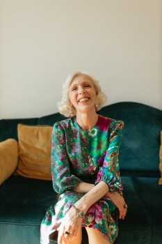 An older woman who is happy because she is eligible for Plan F in Georgia.