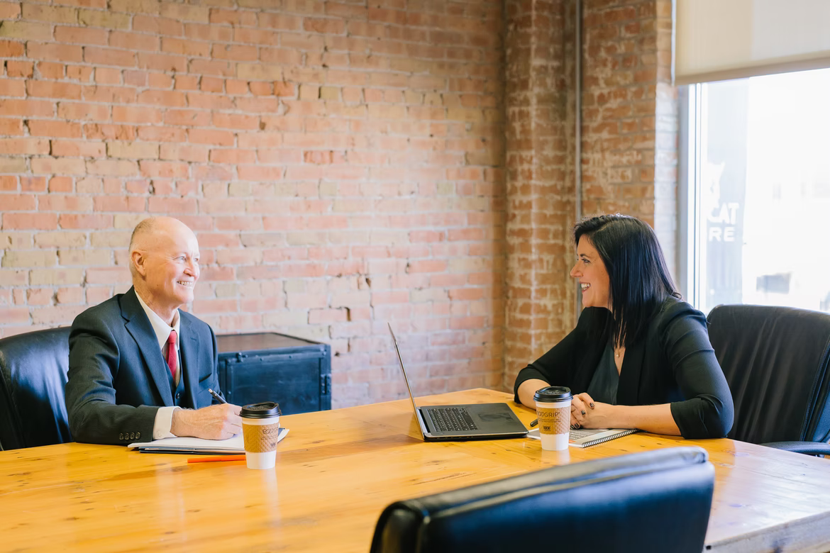 Two people discussing Permanent Life Insurance.