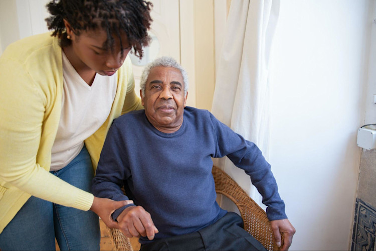 An elderly man in assistant living.