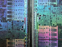 Abstract microscopic photography of a Graphics Processing Unit (GPU) resembling a satellite image of a big city (Fritzchens Fritz / Better Images of AI / GPU shot etched 5 / CC-BY 4.0)