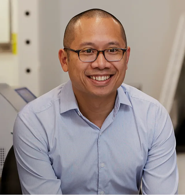 John Pham, Editor-in-Chief, Cell Sitting and looking at camera