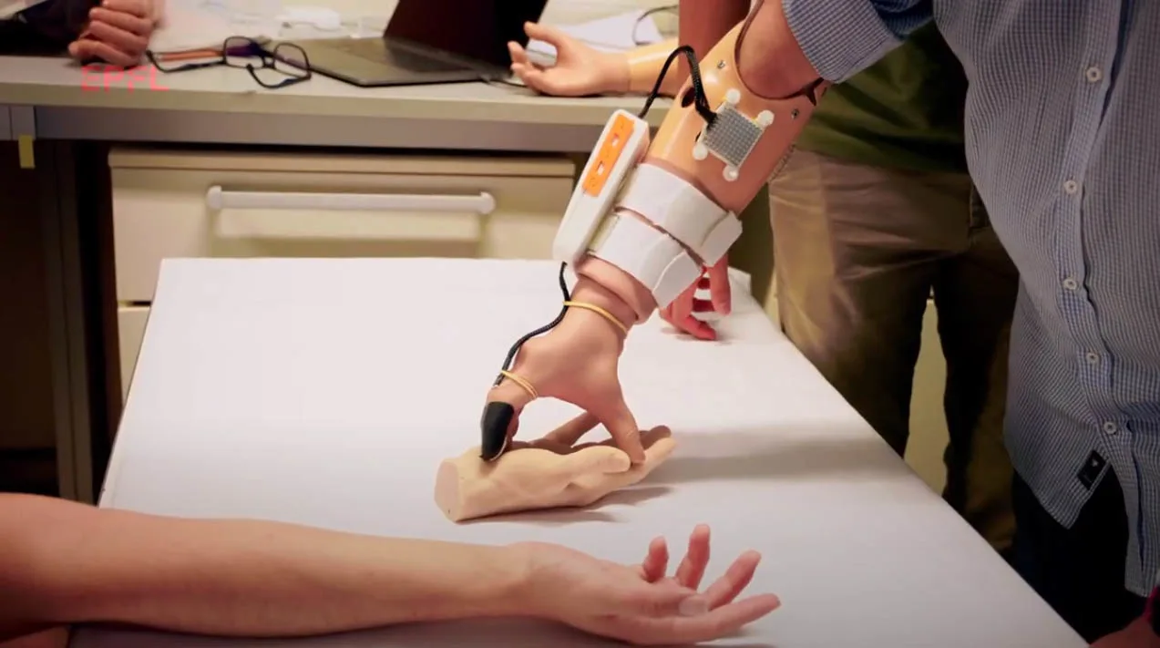 Senior author Dr Solaiman Shokur of the EPFL Translational Neural Engineering Laboratory demonstrates "the first wearable bionic hand that allows amputees to feel temperature in their phantom hand."