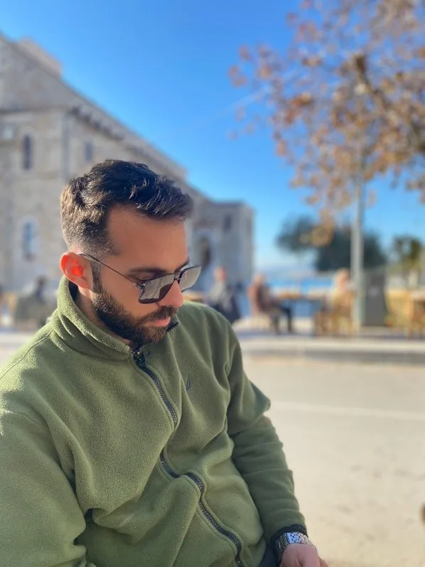Savvas Chamezopoulos looking to the side