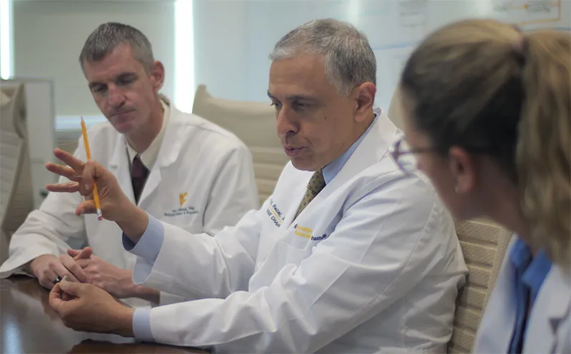Co-author Ali Rezai, MD, holds the Celero VM Pill  in his hand. (Credit: WVU Rockefeller Neuroscience Institute)