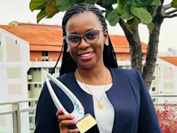 Augustina with OWSD Award