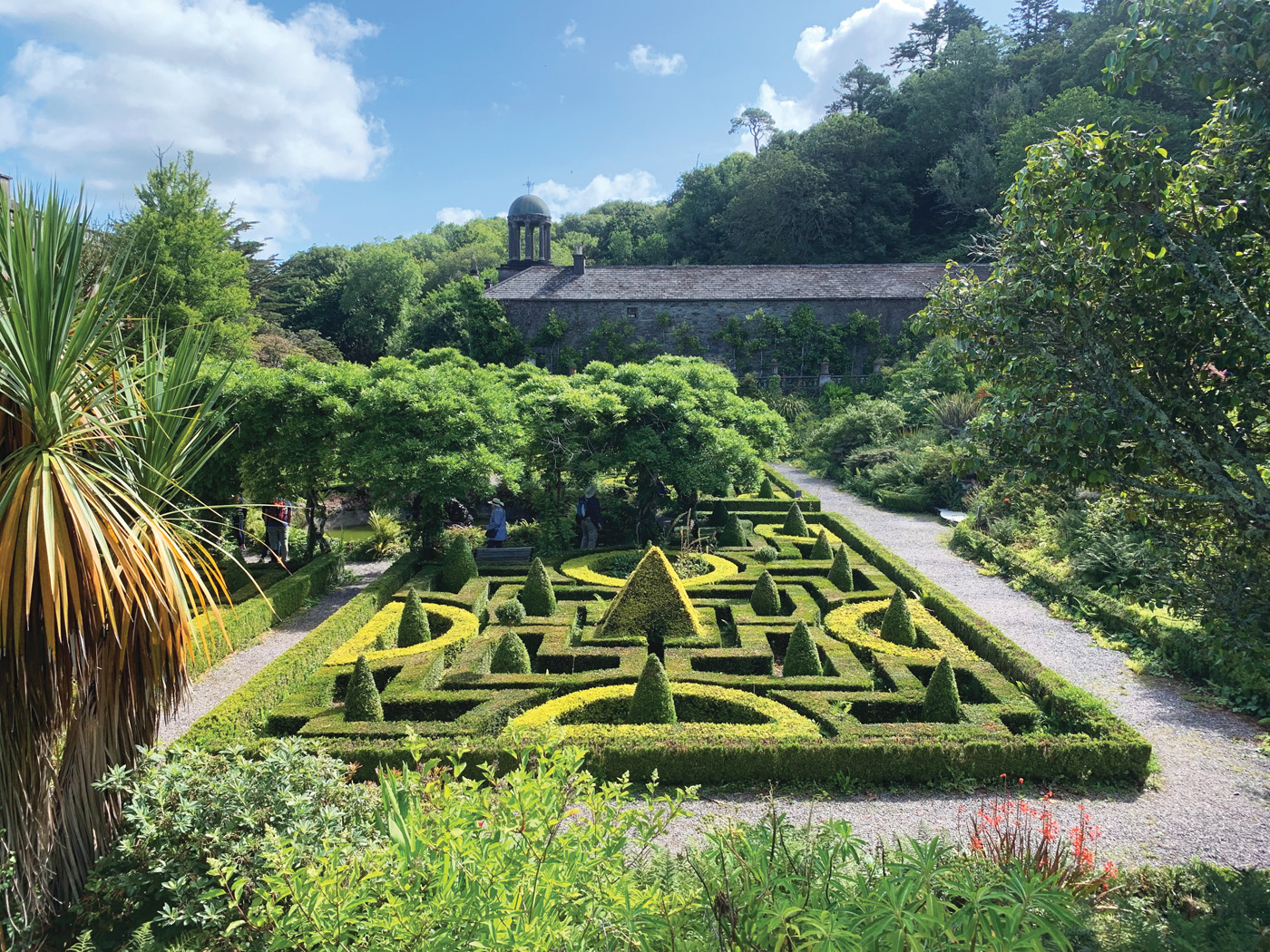 Bantry House parterre in Ireland: Pruning encourages tender new growth that is susceptible to frost, so avoid training shrubs in early spring or late fall.
