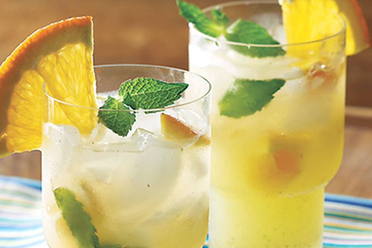 orange mojito cuisine-at-home: Give the Classic Mojito a twist with oranges to makes this delicious summer drink!