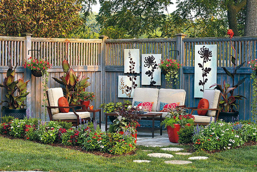 Patio-design-ideas-lead2: Repetition of color in the plants and decor helps unites this patio design.