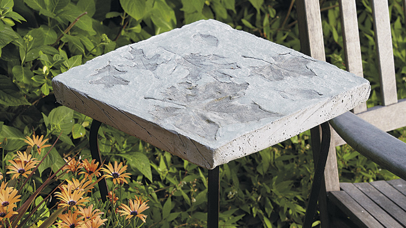 DIY Stepping Stone Accent Table: You can also show off your piece of art as a decorative tabletop.  