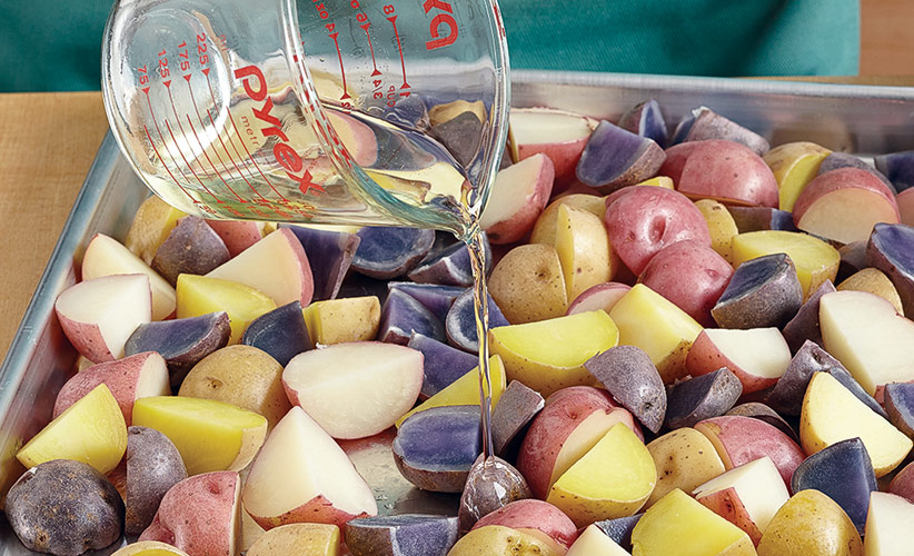 tricolored-potato-salad-recipe-roast-potatoes: Pouring wine over the potatoes
while they’re warm lets them absorb it and enhances flavor.