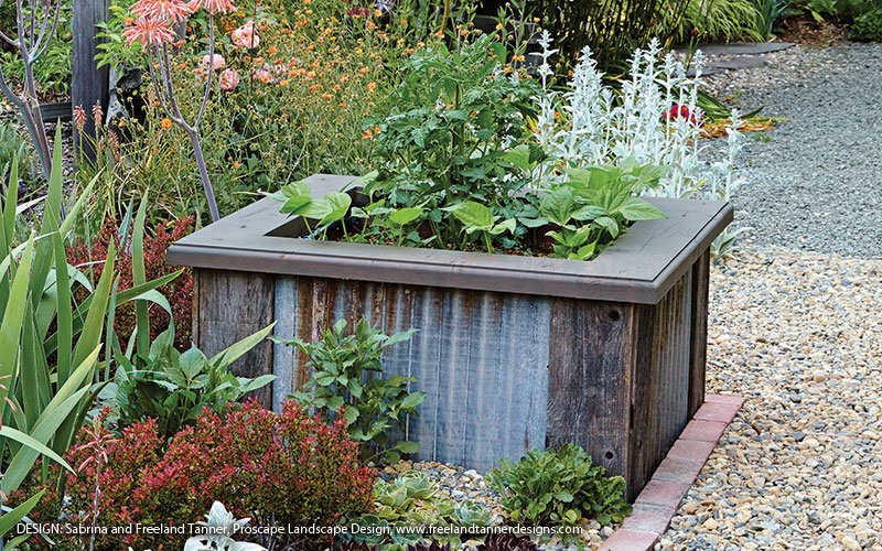 Raised garden bed made out of metal: Corrugated steel raised beds add an industrial chic look to a garden.