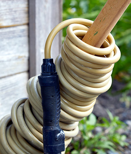 Precoiled polyurethane hose storage tip: Keep the precoiled hose neatly stored by sliding the coils down a length of wood, PVC or a broom handle.