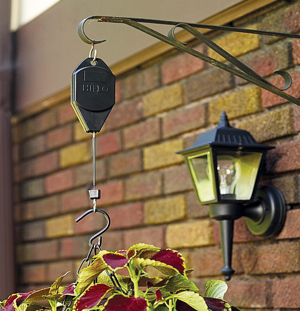 pj-how-to-plant-hanging-basket-pulley: This pulley helps you water hanging baskets that are hung up high more easily.