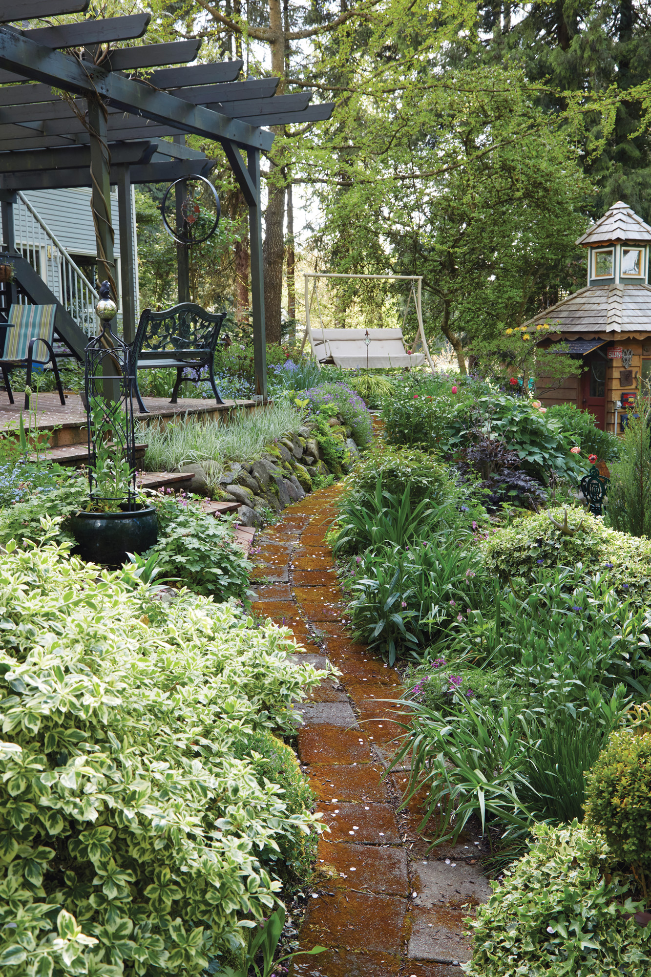GG186 FG Staunton photo 3 terracing: The steepest part of the slope close to the house was the couple’s first terracing project. When the original wooden timbers began to rot, Ted replaced them with stone.