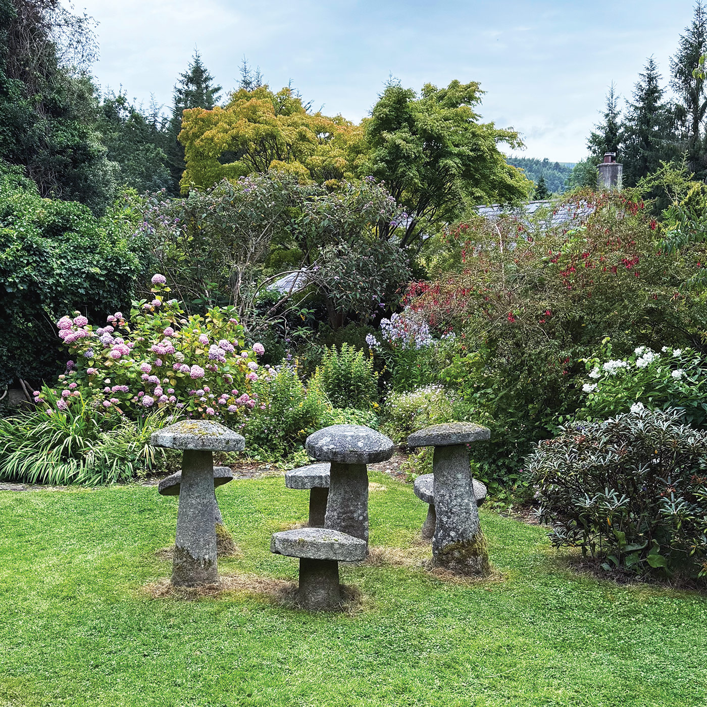 Knock Rose Garden stone ornaments: Some gardeners recommend brushing on a mixture of yogurt (or buttermilk) and water to encourage lichen and moss growth on old stone. While there isn’t definitive evidence that this works, there’s no harm in experimenting with the technique!