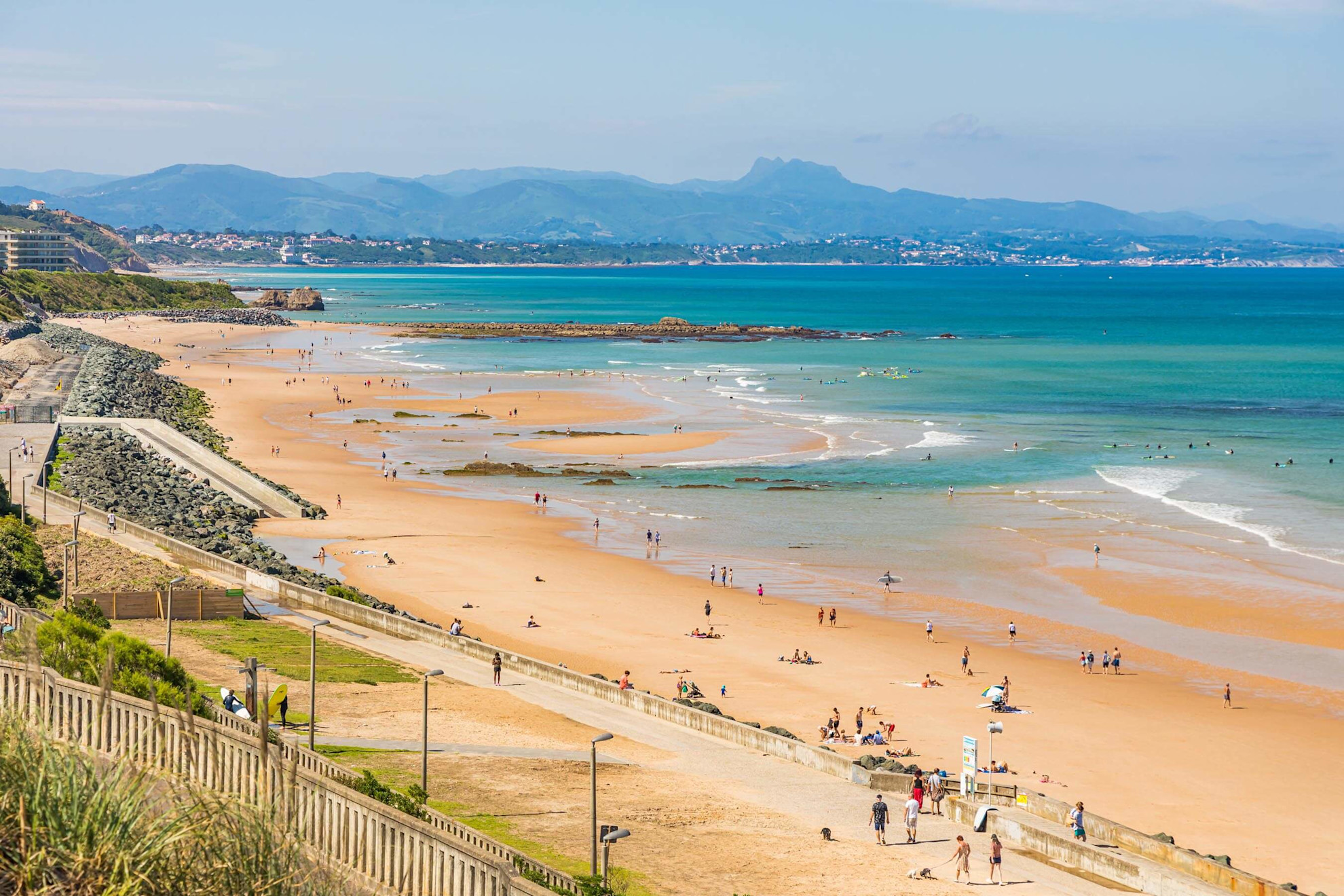 Cote des Basques beach and Pyrenees mountain in the background in Biarritz, France